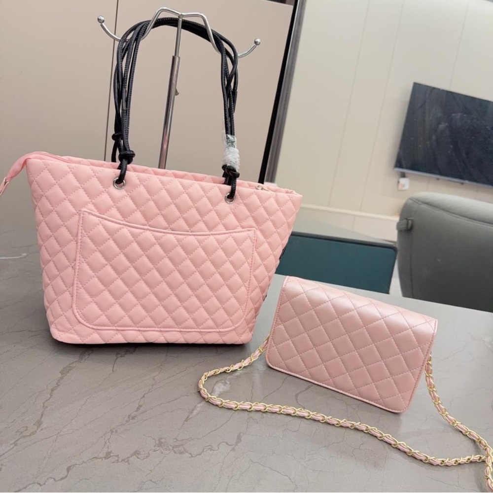 CHANEL Light Pink Quilted Handbag with Black Logo - Picture 2 of 4